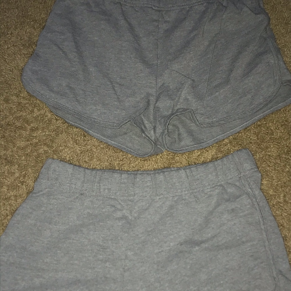 2 pairs of grey shorts
